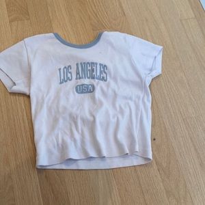Barely worn Los Angeles t shirt with blue piping